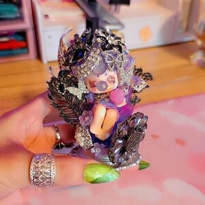 Decorative Fantasy Doll with Black and Purple Accents